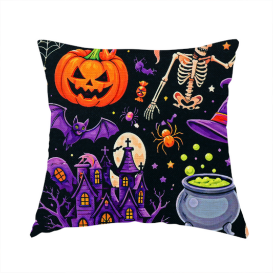The fabric used to create this handmade cushion is a seamless, repeating Halloween-themed pattern featuring a spooky black background crowded with a haunted purple house, a dancing skeleton, a boiling cauldron with green potion, smiling jack-o'-lantern pumpkins, friendly ghosts, a purple witch hat, a purple cat, flying bats, spiders, spiderwebs, candy, and colourful stars.
