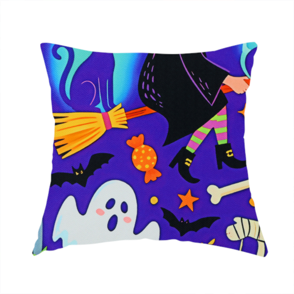 The fabric used to create this handmade cushion is a seamless, repeating Halloween-themed pattern featuring a vibrant purple background filled with a witch riding a broomstick with a black cat, a mummified figure, ghosts, bats, a tombstone, bones, candy, and stars.