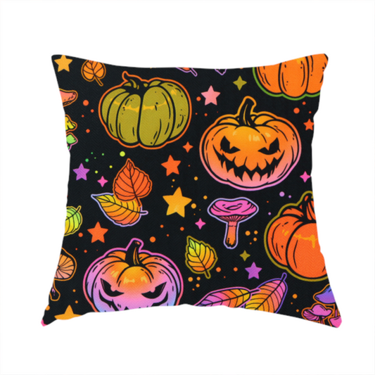 The fabric used to create this handmade cushion is a seamless, repeating Halloween and autumn-themed pattern featuring a black background filled with colourful carved jack-o'-lanterns, pumpkins, mushrooms, autumn leaves, and glowing stars.