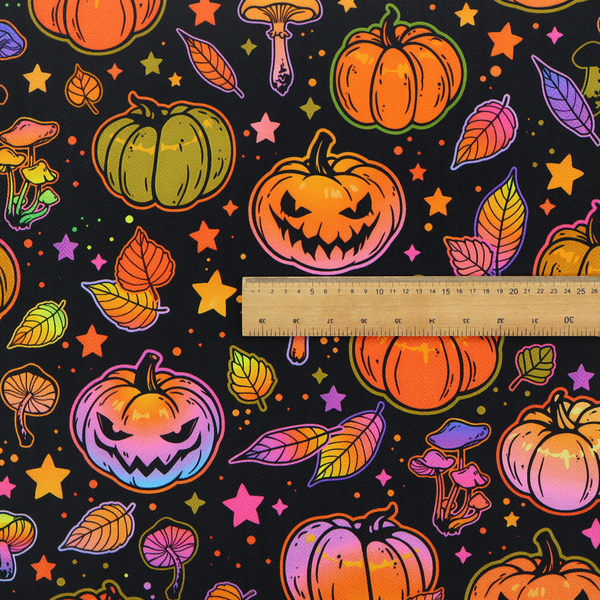 A seamless, repeating Halloween and autumn-themed pattern featuring a black background filled with colourful carved jack-o'-lanterns, pumpkins, mushrooms, autumn leaves, and glowing stars.