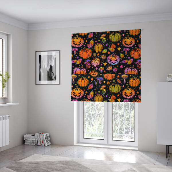 The fabric used to create these Roman blinds is a seamless, repeating Halloween and autumn-themed pattern featuring a black background filled with colourful carved jack-o'-lanterns, pumpkins, mushrooms, autumn leaves, and glowing stars.