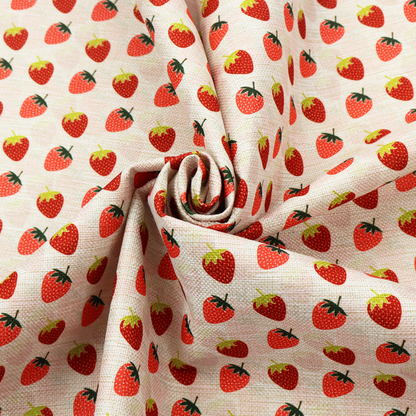 A repeating pattern of small, red strawberries with green stems and leaves, set against a light-toned, textured background with a subtle checked design.