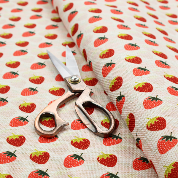 A repeating pattern of small, red strawberries with green stems and leaves, set against a light-toned, textured background with a subtle checked design.