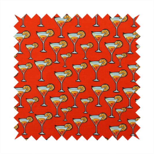 A repeating pattern of cocktail glasses filled with orange liquid, garnished with a slice of orange and a cherry, set against a bright red background.