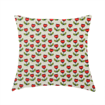 The fabric used to create this handmade cushion is a repeating pattern of small red tulips with green stems and leaves, set against a light-toned, textured background.