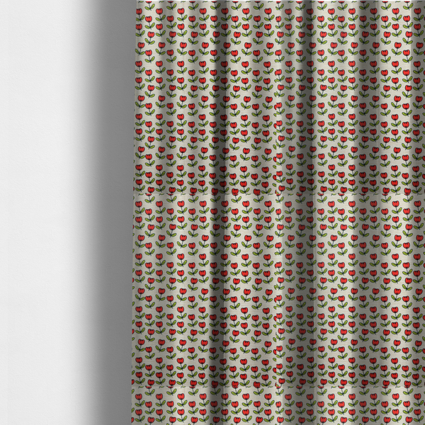 The fabric used to create these made-to-measure curtains is a repeating pattern of small red tulips with green stems and leaves, set against a light-toned, textured background.