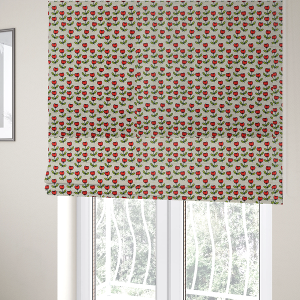 The fabric used to create these Roman blinds is a repeating pattern of small red tulips with green stems and leaves, set against a light-toned, textured background.