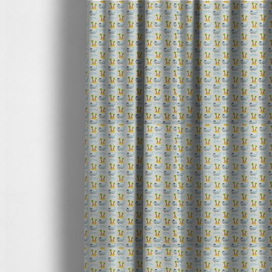 The fabric used to create these made-to-measure curtains is a repeating pattern of small blue whales wearing captain's hats swimming near tiny tropical islands with palm trees, set against a light grey background with small blue wave lines.