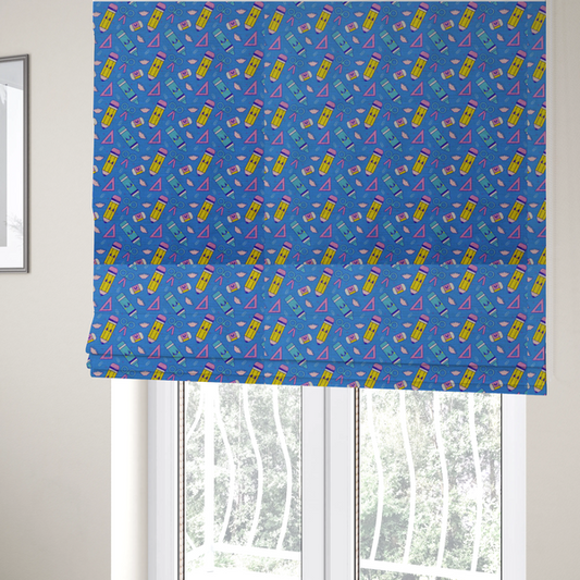 The fabric used to create these Roman blinds is a repeating pattern of cute, kawaii-style school supplies including pencils, crayons, scissors, and rulers on a vibrant blue background.