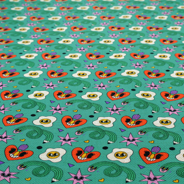 A repeating pattern of quirky, cartoonish motifs including smiling eggs, stylized red hearts with faces, wiggly green pencils, and pink star-like shapes on a teal background.