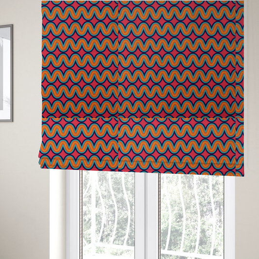 The fabric used to create these Roman blinds is a repeating geometric pattern of undulating, concentric wavy lines in teal, orange, and yellow, outlined in dark blue, set against a vibrant pink background.