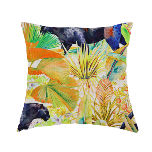 The fabric used to create this handmade cushion is a vibrant tropical pattern featuring prowling dark leopards and jaguars hidden among lush jungle foliage, oversized palm leaves, and bright floral accents in warm and cool tones.
