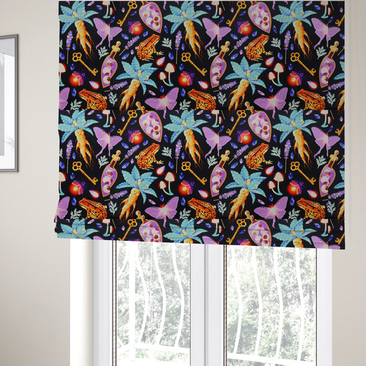 The fabric used to create these Roman blinds is a vibrant, repeating mystical pattern on a black background featuring illustrated mandrake roots with faces, orange frogs, purple moths, glowing fireflies, potion bottles filled with eyeballs, ornate golden keys, luminescent mushrooms, lavender sprigs, and scattered crystals.
