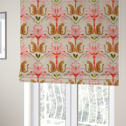 The fabric used to create these Roman blinds is a symmetrical, repeating tropical pattern on a light background featuring stylized leopards sitting below bright pink and red palm trees, accented with pink flowers, green foliage, and geometric dotted arches.