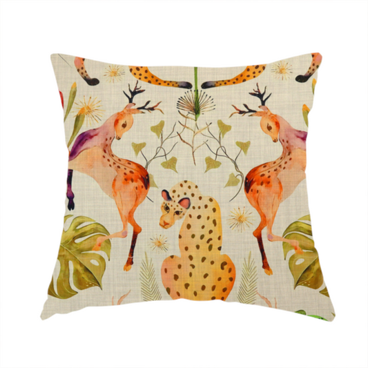 The fabric used to create this handmade cushion is a symmetrical, illustrative pattern featuring spotted leopards, leaping deer, large red flowers, green parrots, monstera leaves, and starburst details on a light background.