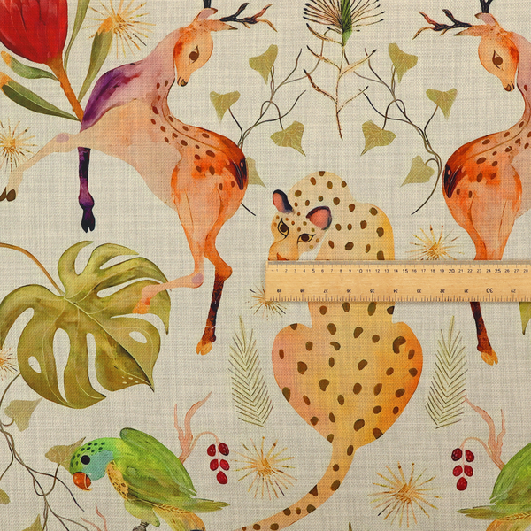 A symmetrical, illustrative pattern featuring spotted leopards, leaping deer, large red flowers, green parrots, monstera leaves, and starburst details on a light background.