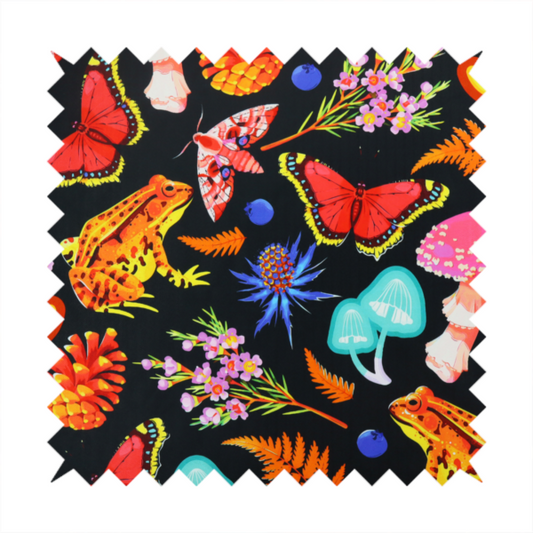 A vibrant, repeating botanical pattern on a black background featuring bright red butterflies, orange spotted frogs, orange pinecones, pink and white mushrooms, orange fern fronds, blue berries, and purple wildflowers.