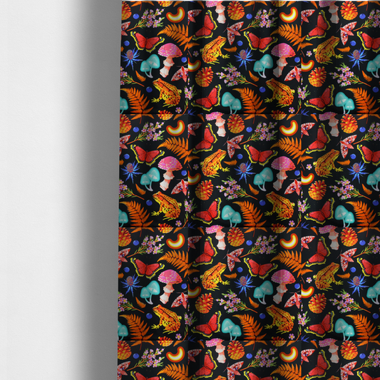 The fabric used to create these made-to-measure curtains is a vibrant, repeating botanical pattern on a black background featuring bright red butterflies, orange spotted frogs, orange pinecones, pink and white mushrooms, orange fern fronds, blue berries, and purple wildflowers.