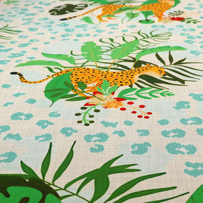 A repeating pattern featuring spotted cheetahs amidst lush green tropical leaves, red floral accents, and a teal leopard print background.