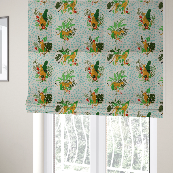 The fabric used to create these Roman blinds is a repeating pattern featuring spotted cheetahs amidst lush green tropical leaves, red floral accents, and a teal leopard print background.