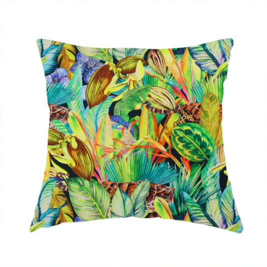 The fabric used to create this handmade cushion is a vibrant tropical botanical pattern featuring lush green leaves, exotic flowers, and hidden jaguars prowling through a dense jungle foliage.