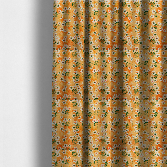 The fabric used to create these made-to-measure curtains is a retro floral pattern featuring delicate white flowers, green branching stems, and large orange botanical motifs set against a warm yellow background.