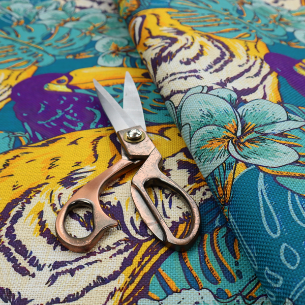 Vibrant tropical pattern featuring majestic tigers, toucans, and exotic flowers amongst lush green foliage on a bold blue background.  