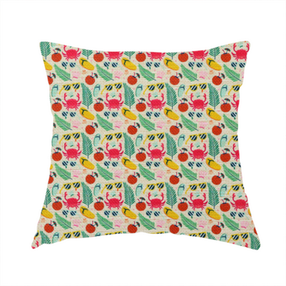 The fabric used to create this handmade cushion is a vibrant summer vacation pattern featuring pink crabs, tropical palm fronds, yellow flip-flops, sunglasses, and coconuts on a light background.