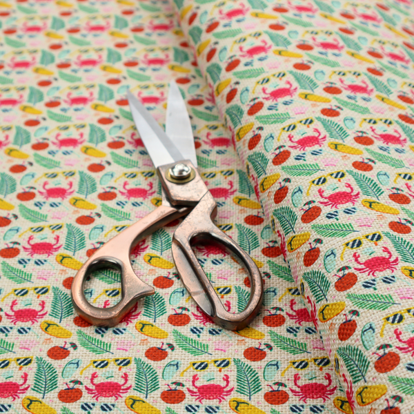 Vibrant summer vacation pattern featuring pink crabs, tropical palm fronds, yellow flip-flops, sunglasses, and coconuts on a light background.