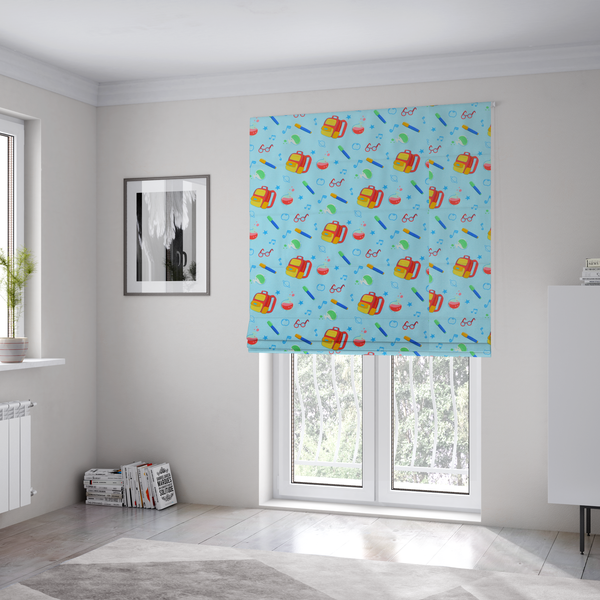The fabric used to create these Roman blinds is a seamless repeating school-themed pattern featuring backpacks, beakers, glasses, pens, and musical notes scattered over a light blue background.