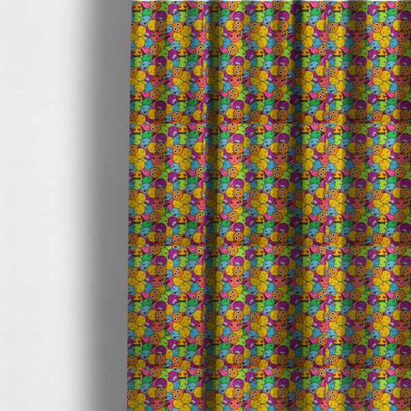 The fabric used to create these made-to-measure curtains is a dense, overlapping pattern of colourful, stylized emoji faces displaying various cartoonish expressions, including winking, laughing, dizzy, and neutral expressions, in a vibrant mix of yellow, orange, blue, green, and pink.