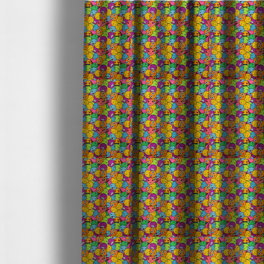 The fabric used to create these made-to-measure curtains is a dense, overlapping pattern of colourful, stylized emoji faces displaying various cartoonish expressions, including winking, laughing, dizzy, and neutral expressions, in a vibrant mix of yellow, orange, blue, green, and pink.