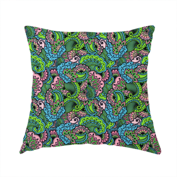 The fabric used to create this handmade cushion is a seamless repeating pattern featuring intricate paisley and mandala-style motifs filled with detailed line work and flourishes in a vibrant palette of neon green, bright blue, and pink.