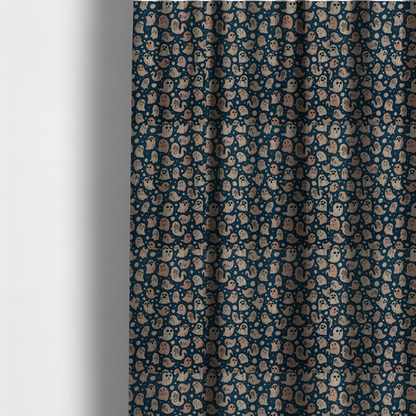 The fabric used to create these made-to-measure curtains is a dark blue fabric patterned with an all-over, repeating design of light beige and peach cartoon ghosts with various cute and silly facial expressions, interspersed with small white polka dots.