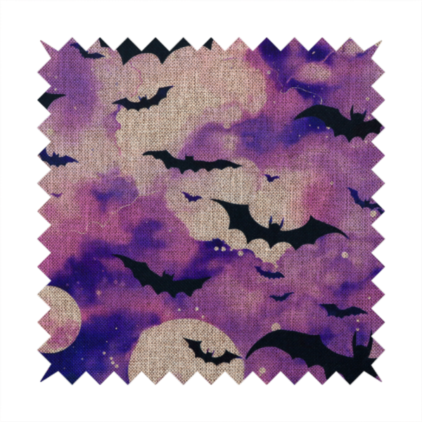A watercolour-style Halloween fabric featuring a spooky night sky in shades of purple and pink, filled with silhouettes of flying black bats and two pale full moons.