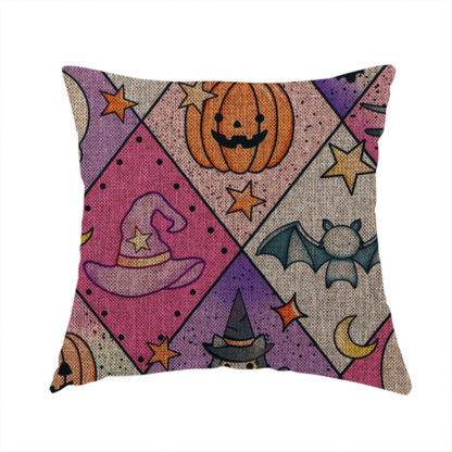 The fabric used to create this handmade cushion is a Halloween-themed harlequin pattern fabric with diamond-shaped sections in purple, pink, and beige, featuring cartoon illustrations of Jack-o'-lanterns, a witch's cat, ghosts, bats, skulls, spiders, stars, and crescent moons.