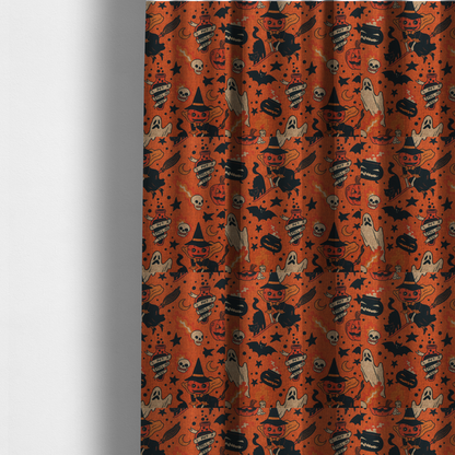 The fabric used to create these made-to-measure curtains is an orange Halloween fabric patterned with various black illustrations, including a witch with a pumpkin head flying on a broomstick, a black cat, ghosts, skulls, potion bottles with the text "I put a spell on you," bats, cauldrons, and stars.