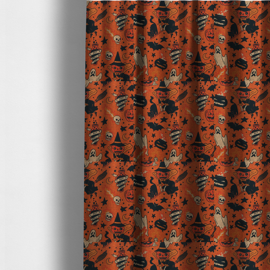 The fabric used to create these made-to-measure curtains is an orange Halloween fabric patterned with various black illustrations, including a witch with a pumpkin head flying on a broomstick, a black cat, ghosts, skulls, potion bottles with the text "I put a spell on you," bats, cauldrons, and stars.
