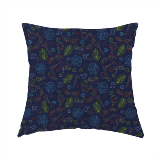 The fabric used to create this handmade cushion is a repeating pattern of festive party and carnival-themed outlined icons including masquerade masks, maracas, cocktails, musical notes, palm fronds, and stars on a dark navy blue background.