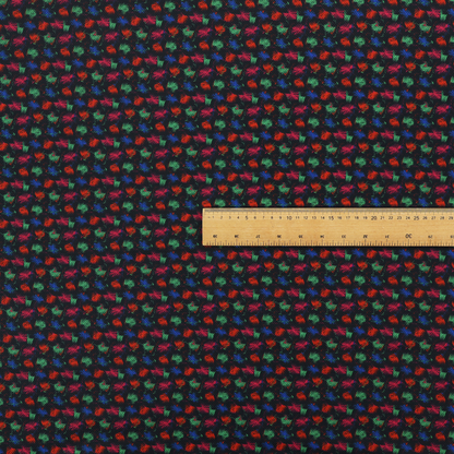 A textured tweed-style fabric featuring a dark background interwoven with dense specks of vibrant red, green, and blue flecks.