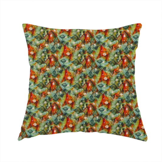 The fabric used to create this handmade cushion is a dense, abstract geometric pattern featuring interconnected triangular shapes and circular motifs in shades of green, orange, red, and teal.
