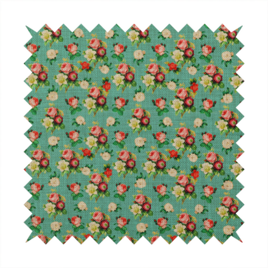 A charming repeating pattern of small bouquets featuring pink and red roses paired with white blossoms and green leaves set against a textured teal background.