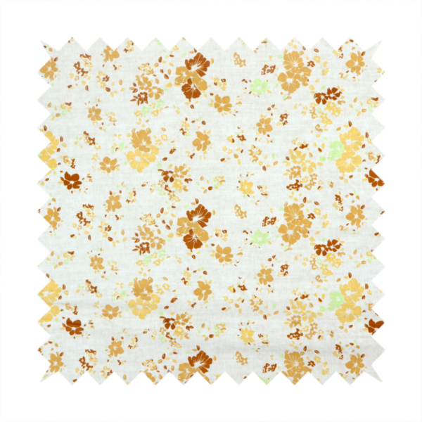 A delicate, ditsy floral repeating pattern on an off-white background featuring small clusters of flowers and leaves in shades of yellow, gold, brown, and pale green.