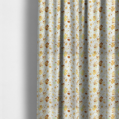 The fabric used to create these made-to-measure curtains is a delicate, ditsy floral repeating pattern on an off-white background featuring small clusters of flowers and leaves in shades of yellow, gold, brown, and pale green.