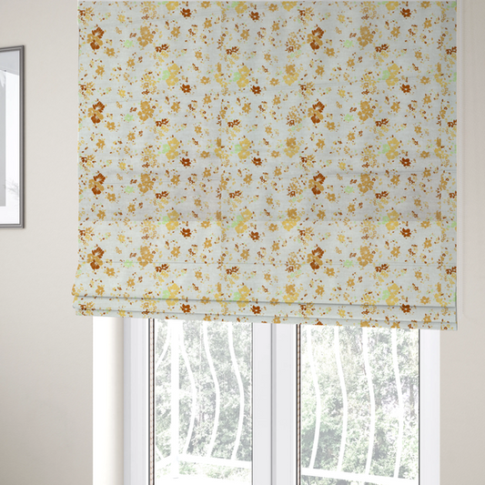 The fabric used to create these Roman blinds is a delicate, ditsy floral repeating pattern on an off-white background featuring small clusters of flowers and leaves in shades of yellow, gold, brown, and pale green.