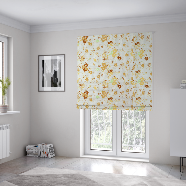 The fabric used to create these Roman blinds is a delicate, ditsy floral repeating pattern on an off-white background featuring small clusters of flowers and leaves in shades of yellow, gold, brown, and pale green.