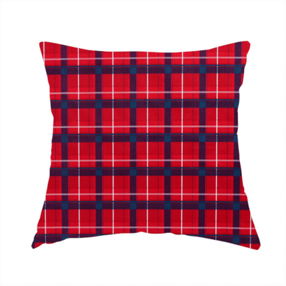 The fabric used to create this handmade cushion is a vibrant red plaid and tartan pattern featuring intersecting dark blue and white stripes over a bold red background.