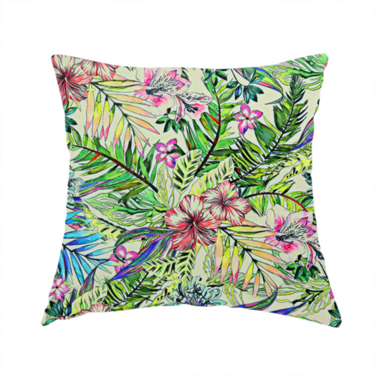 The fabric used to create this handmade cushion is a vibrant, dense tropical pattern featuring colourful hibiscus and orchid flowers, spiky blue and white blooms, and lush green and blue palm leaves.