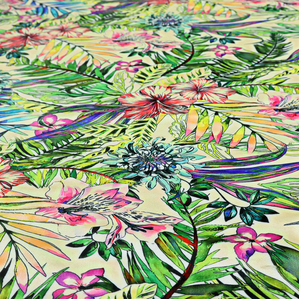 A vibrant, dense tropical pattern featuring colourful hibiscus and orchid flowers, spiky blue and white blooms, and lush green and blue palm leaves.