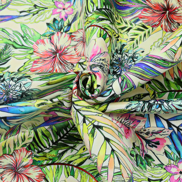 A vibrant, dense tropical pattern featuring colourful hibiscus and orchid flowers, spiky blue and white blooms, and lush green and blue palm leaves.